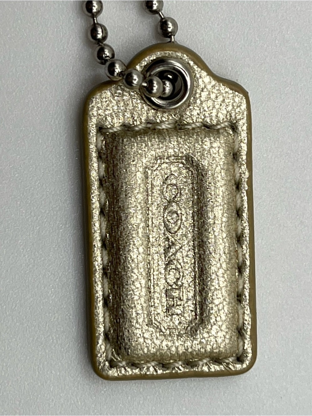 Coach Metallic Gold Leather Hang Tag with Ball Chain